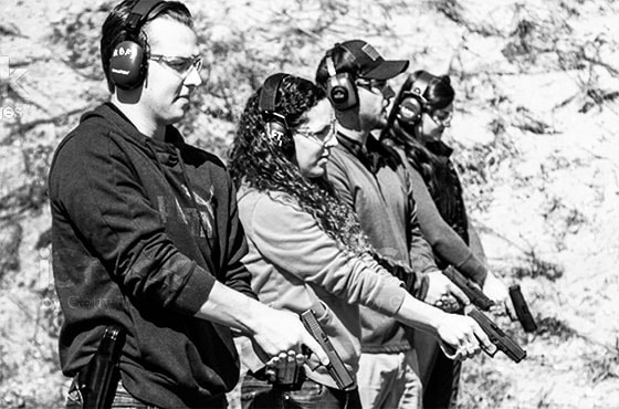 Students on shooting range for handgun training